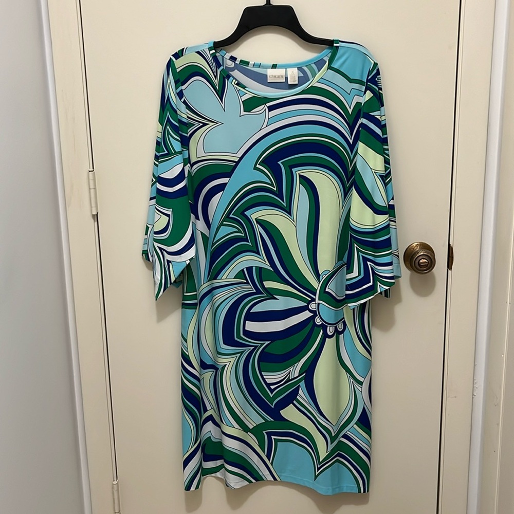 Multi colored dress. Sleeves are split per photo. Smoke free home. Never worn.